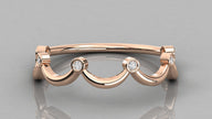 Direct front view of the Cloudia rose gold ring, focusing on the six lab diamonds integrated into the wavy band.
