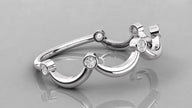 Lying perspective of the Cloudia white gold ring, emphasizing the polished cloud-shaped curves.