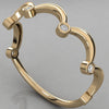 An angled perspective view of the Cloudia 14k yellow gold ring, with six stones set along the wavy silhouette.