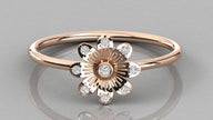 Draufsicht auf das Modell Helia in Rosegold: Symmetrische Blumenform mit brillanten Labordiamanten.