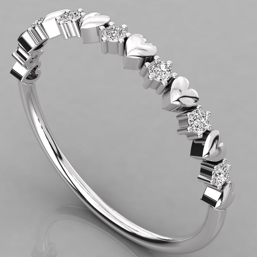 Three-quarter perspective view of the Juliette 585 white gold heart eternity band showcasing brilliant-cut lab-created diamonds.