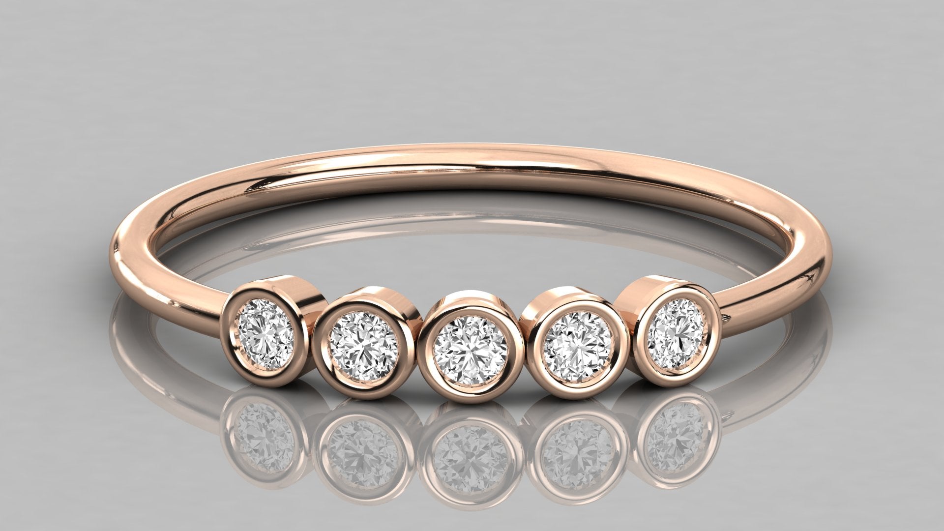 Direct frontal view of the Luna 14k rose gold ring highlighting the symmetrical row of five sparkling 2.0mm diamonds.