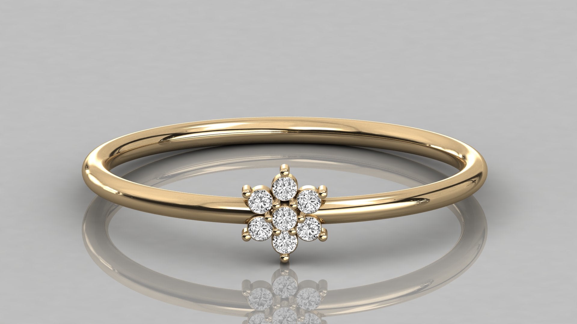 Direct frontal shot of the Mira 14k yellow gold ring showcasing the sparkling lab-grown diamond flower motif.