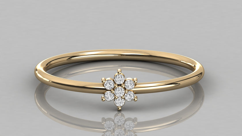 Direct frontal shot of the Mira 14k yellow gold ring showcasing the sparkling lab-grown diamond flower motif.