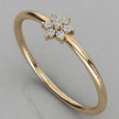 Perspective view of the Mira 14k yellow gold ring where diamonds form a radiant golden flower cluster.