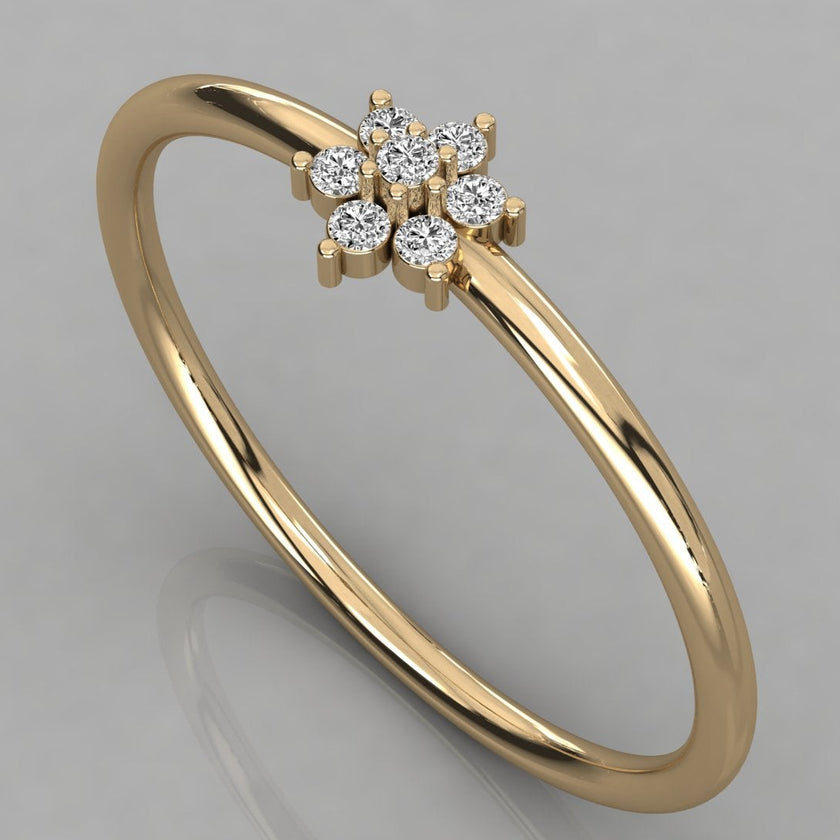 Perspective view of the Mira 14k yellow gold ring where diamonds form a radiant golden flower cluster.