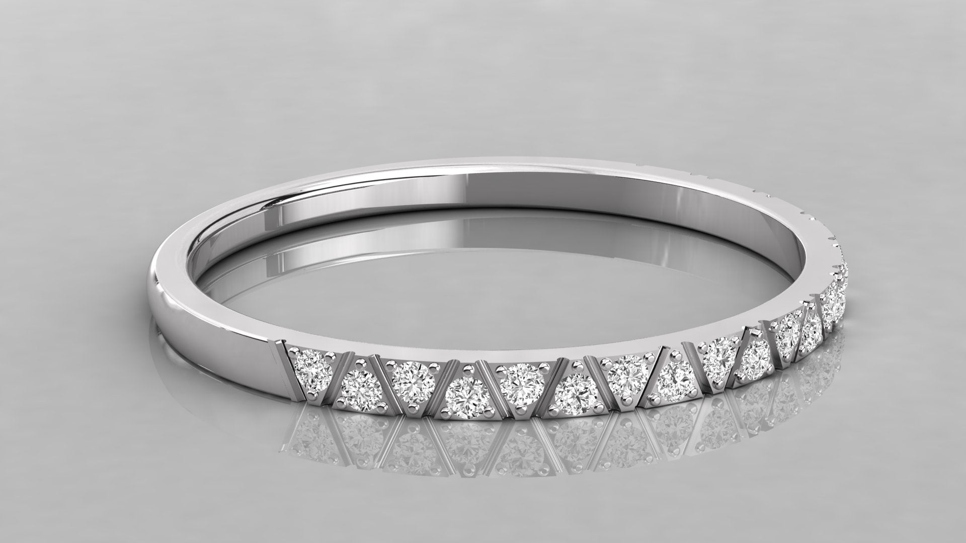 Horizontal lying shot of the Nova white gold band emphasizing the clean minimalist lines.