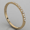 Angled perspective of Nova 14k yellow gold eternity ring with a continuous stone row.