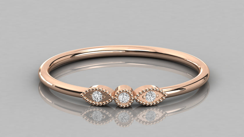 Direct overhead view of the Selene 14K rose gold trilogy ring, showcasing the symmetrical row of three sparkling lab-grown diamonds.