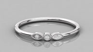 Professional overhead view of the Selene 14K white gold ring, emphasizing the brilliant sparkle of the sustainable three-stone design.