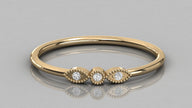 Professional top view of the Selene 14K yellow gold ring, highlighting the elegant milgrain texture around the 1.3mm and 1.5mm diamonds.