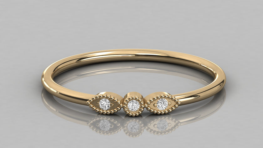 Professional top view of the Selene 14K yellow gold ring, highlighting the elegant milgrain texture around the 1.3mm and 1.5mm diamonds.