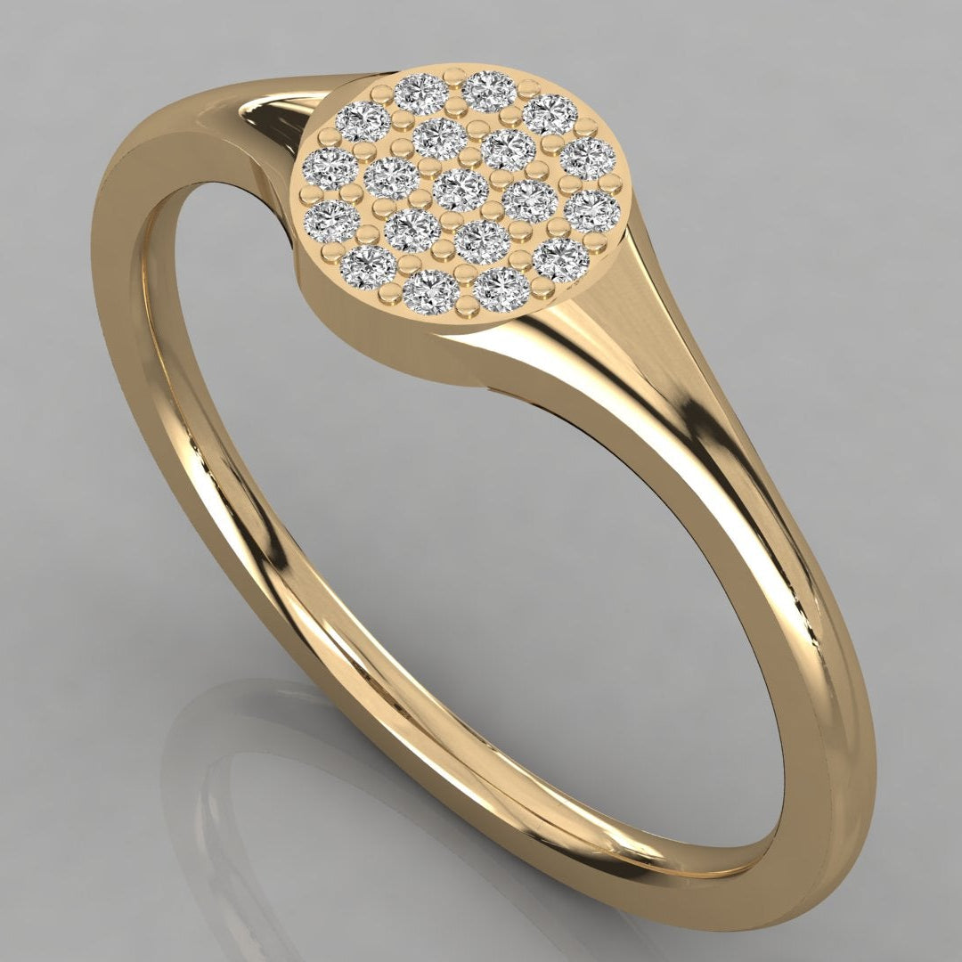 An angled perspective of the Stella 14K yellow gold signet ring featuring a radiant cluster of 19 sustainable lab-grown diamonds.