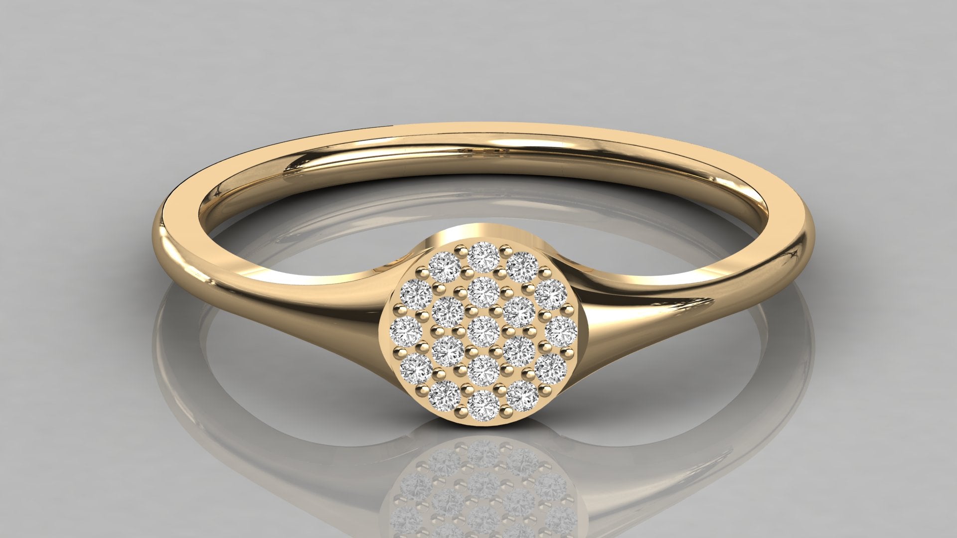 Close-up top view of the Stella yellow gold modern signet ring, highlighting the brilliant sparkle of the nineteen 1mm lab diamonds.