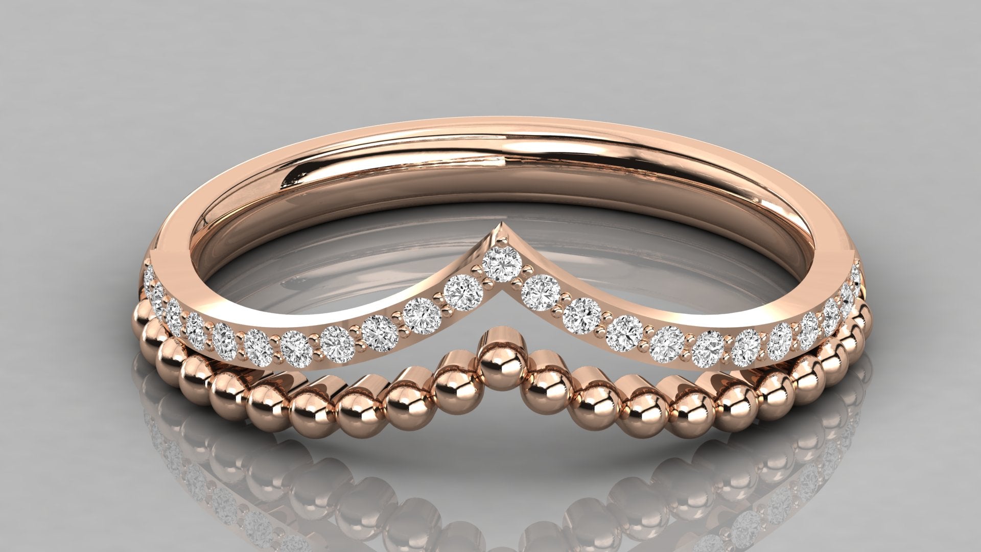 Draufsicht Vesta Ring Rosegold: Elegante Kombination aus Brillantschliff-Diamanten und strukturierter Goldschiene.